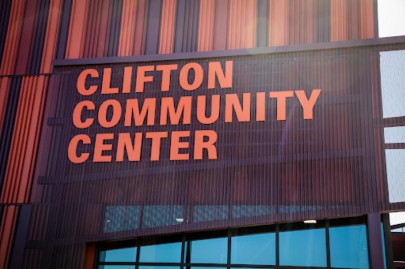 Orange and purple building with orange sign reading, "Clifton Community Campus."