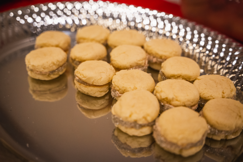 Small white cookie sandwiches.