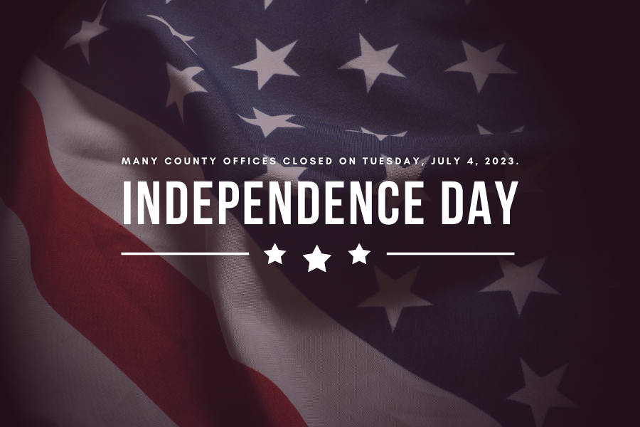 American flag background reading "Many County offices closed Tuesday, July 4, 2023, Independence Day" in white font.