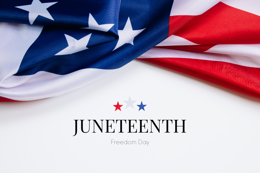 American flag and three red white and blue stars reading "Juneteenth Freedom Day"