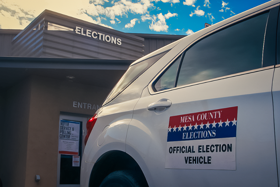 An elections vehicle pulls into the Elections Office, 200 S. Spruce St.